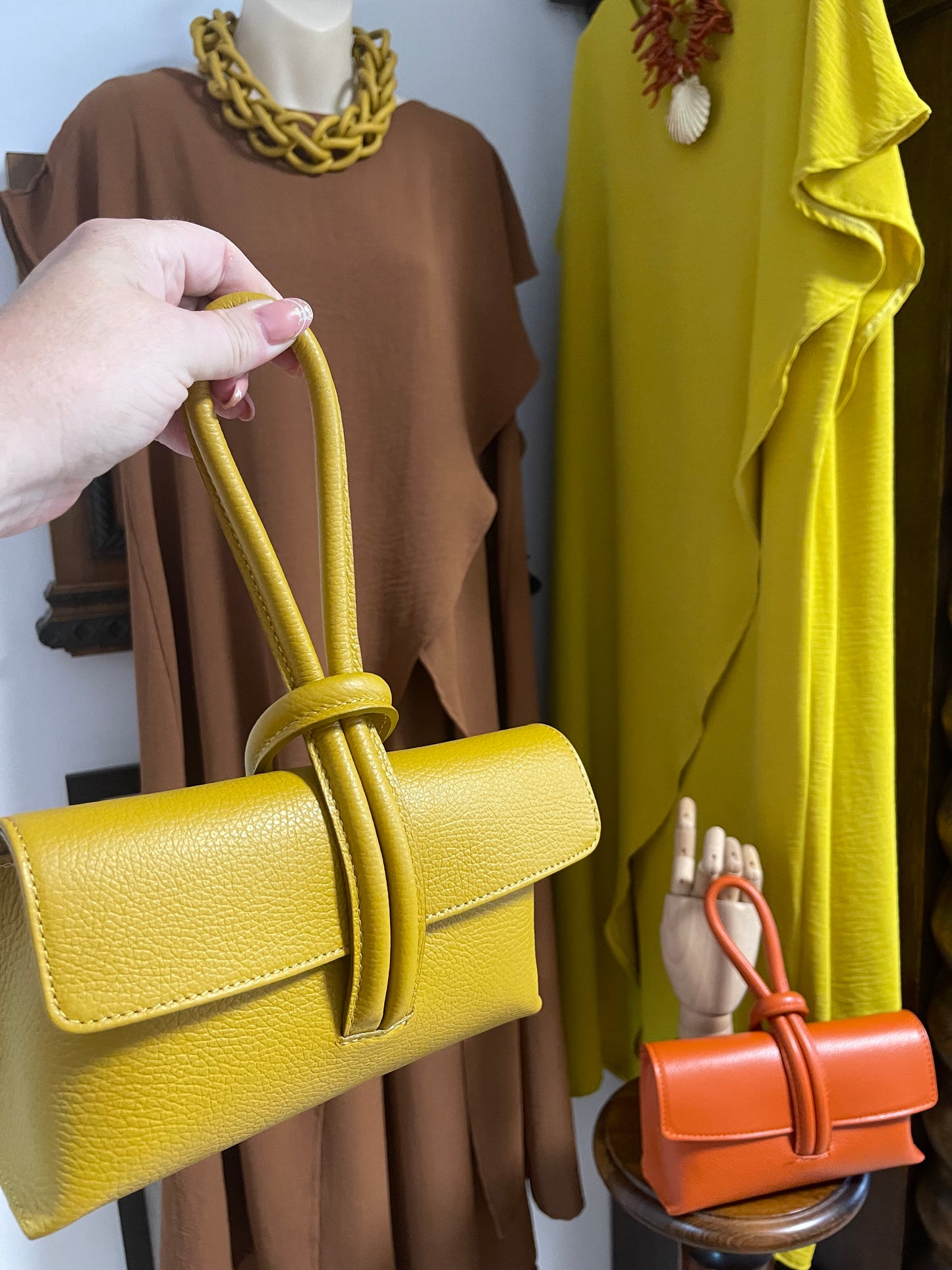 Leather ochre wristlet bag