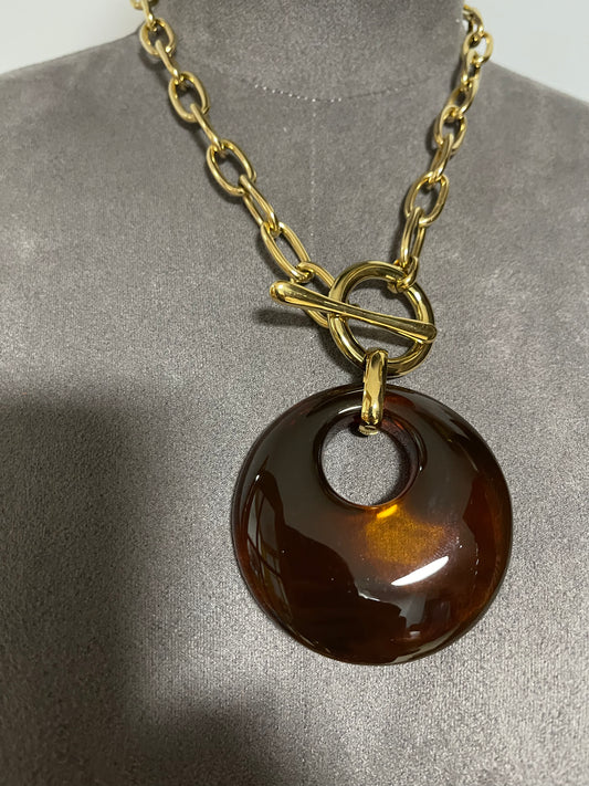 Link neckpiece with resin centre