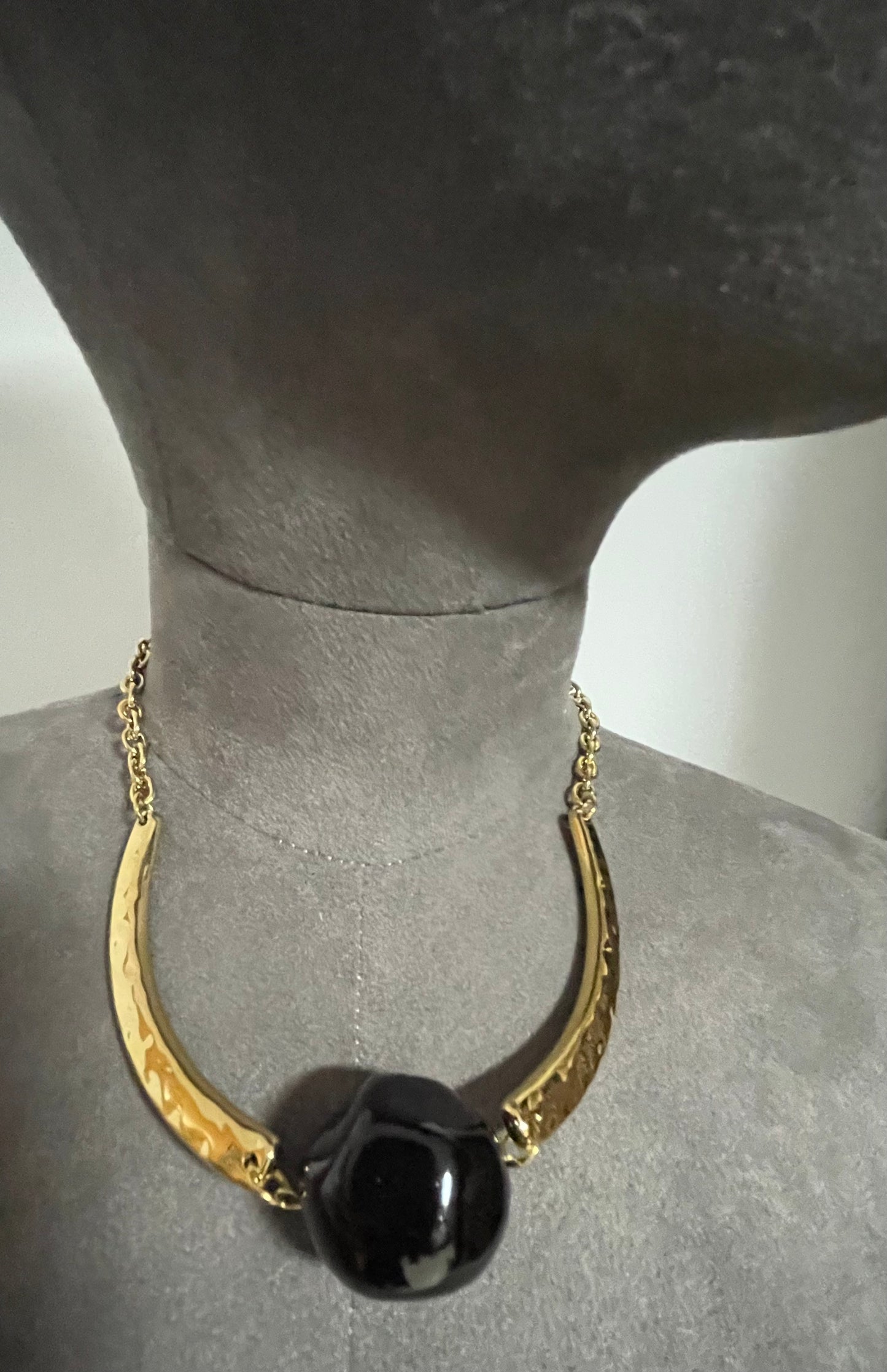 Hammered gold effect neckpiece with large resin bead