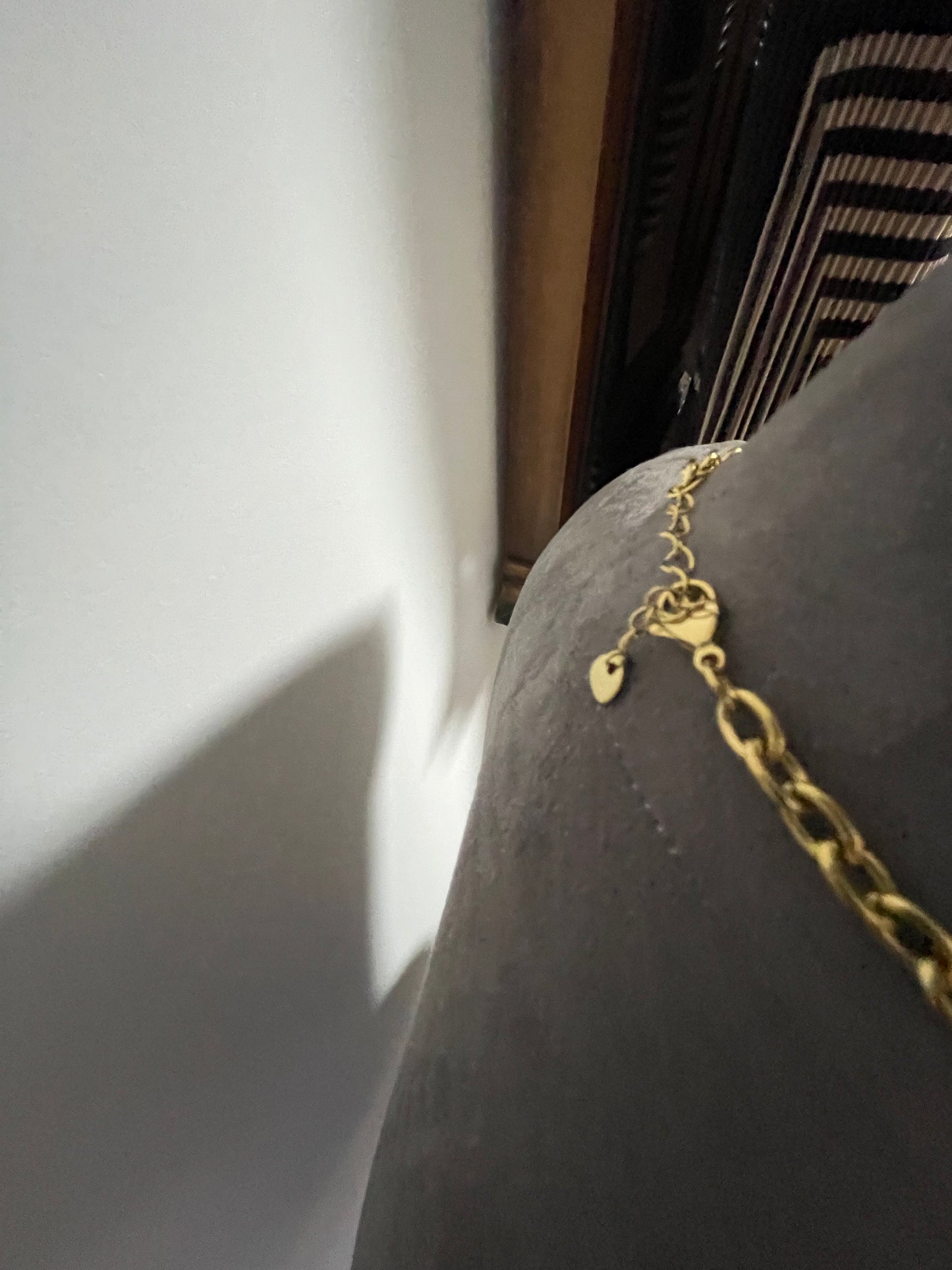 Hammered gold effect neckpiece with large resin bead